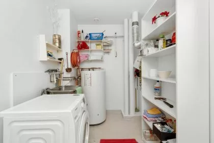 Utility room water heater for a heat pump water heater guide